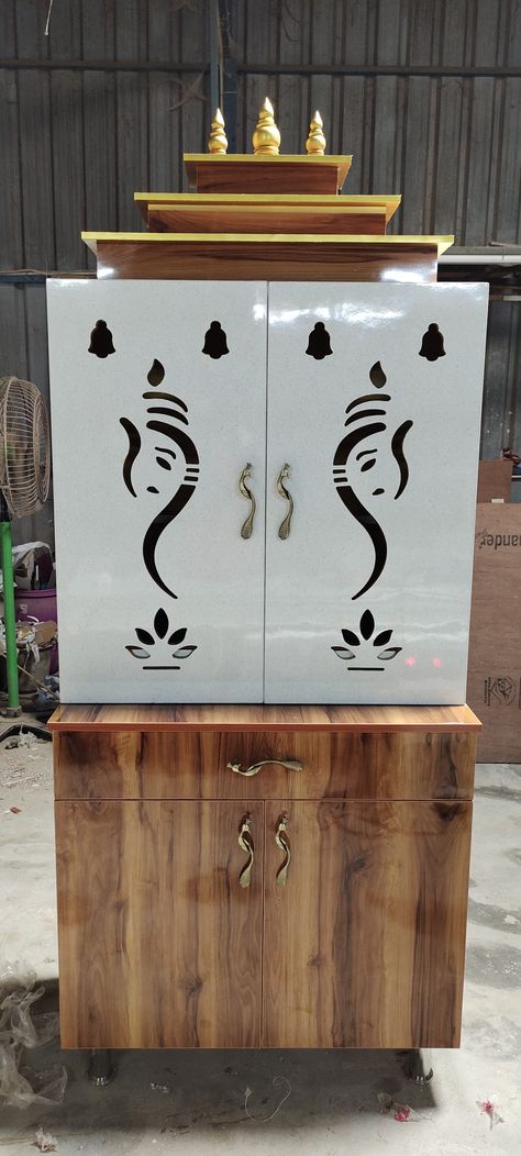 Glossy dual tone with carving design Pooja cabinet Pooja Mandir Cabinet, Pooja Room Pvc Door Design, Pooja Cupboard Door Design, Puja Cupboard Design, Puja Room Cnc Design, God Cupboard Design, Cnc Temple Design, Cnc Pooja Door Design Modern, Pooja Room Cupboard Designs