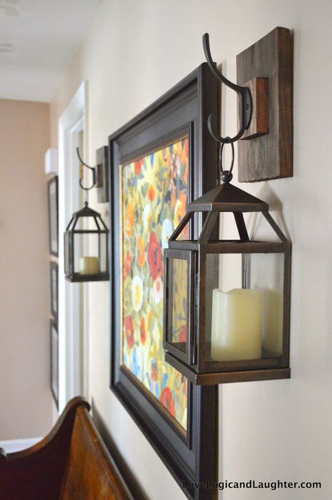 I struggle with decorating my front entryway.  I move furniture and wall decor into and out of it on a seasonal basis and am never entirely happy with the end result.  After the most recent move of furniture I decided that I wanted lanterns or sconces to flank a painting that was hung above our… Continue reading Wall Lantern Hooks For My Entryway – DIY Decorating Entryway, Lantern Decor Living, Entryway Decorating, Lantern Hooks, Rustic Entryway, Lantern Ideas, Farmhouse Remodel, Lanterns Decor, Farmhouse Rustic