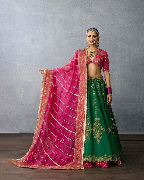 The Mayuri Srisa lehenga by #Torani reimagines the tree of life with playful card-inspired motifs. Crafted in organza and jeni silk, its vibrant jewel tones pair beautifully with antique dabka and moti detailing. Shop this look at #AashniKalaGhoda. Also shop #Torani at #AashniOnline. Aashni + Co Ador House, 6, K Dubash Marg, Kala Ghoda, Fort, Mumbai, Maharashtra 400001 Timings: 11:00 am - 7:00pm IST 📞+91 2235305776 Shop worldwide: 🌏aashniandco.com For any assistance or for booking an appo... Torani Lehenga, Mumbai Maharashtra, The Tree Of Life, Jewel Tones, Tree Of Life, Mumbai, Lehenga, Fort, Silk