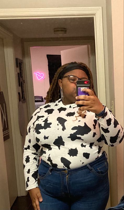 This is a cowprint mockneck shirt from shein! Ive never worn cow print before but i think it really does compliment my figure! I think the fit would look even better with a belt! If you want to get this make sure you size up! Experimental Outfits, Cow Print Top, Cow Print, Plus Size T Shirts, Print Top, Print Tops, Mock Neck, Stylish Outfits, Style Me