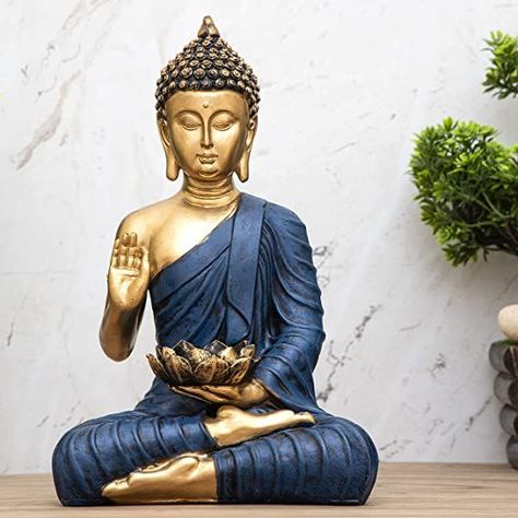 Material: Polystone
Size (L x W x H): 15 cm x 10 cm x 26 cm: Weight : 300 gm
Colour: Blue Golden
Care Instruction: Wipe with soft clean cloth
Made In India Decor Items For Living Room, Buddha Statue Home, Buddha Idol, House Warming Ceremony, Antique Gifts, Meditation Decor, Marriage Couple, Sitting Buddha, Lord Buddha