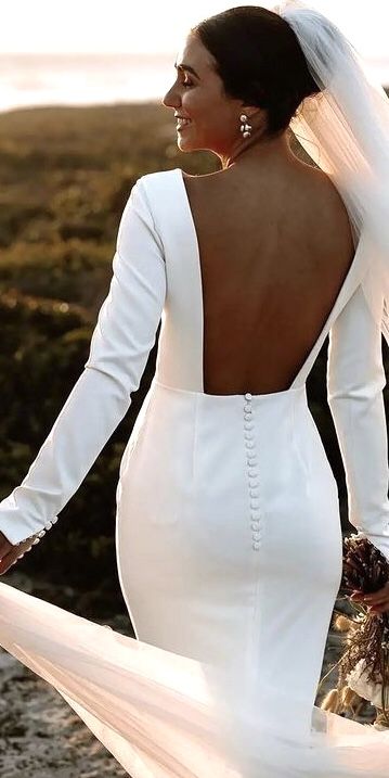 Long Sleeve Button Wedding Dress, Slim Fitting Wedding Dresses Long Sleeve, Retro Satin Wedding Dress, High Neck Low Back Wedding Dress With Sleeves, Low Back With Sleeves Wedding Dress, High Neck Long Sleeve Open Back Wedding Dress, Wedding Dress Silk Long Sleeve, Clean Long Sleeve Wedding Dress, Long Sleeve Modern Wedding Dress