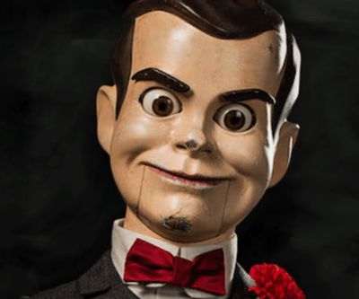 The seemingly immortal ventriloquist doll, Slappy the Dummy, first appeared in R.L. Stein’s Goosebumps. Slappy deceives humans into bringing him to life by keeping a sheet of paper in his suit pocket that says the words “Karru Marri Odonna Loma Molonu Karrano” which instantly bring him to life as soon as these words are spoken. Mask