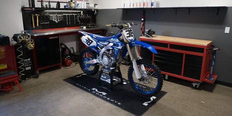 How To Set Up the Perfect Moto Garage | MotoSport Motocross Room, Dirt Bike Shop, Garage Refrigerator, Dirt Bike Room, Yamaha Motocross, Garage Design Interior, Garage Organisation, Nitro Circus, Garage Workshop Organization