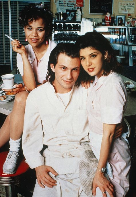 "Untamed Heart" promo still, 1993.  L to R: Rosie Perez, Christian Slater, Marisa Tomei.  PLOT: A waitress (Tomei) and her co-worker (Perez) hardly notice a shy busboy (Slater).  Tomei's character is attacked and the busboy comes to her rescue, starting a relationship. Rosie Perez, Untamed Heart, Little Dorrit, Marisa Tomei, Christian Slater, Reaction Face, Love Movie, Silver Screen, Great Movies