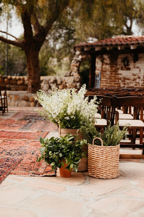 Budget Wedding Floral Ideas, Wedding Ceremony Potted Plants, Potted Plant Ceremony Decor, Basket Flower Wedding, Potted Plant Wedding Aisle, Potted Plants At Wedding, Potted Plants Wedding Alter, Church Wedding Alter Flowers, Flowers In Baskets Wedding