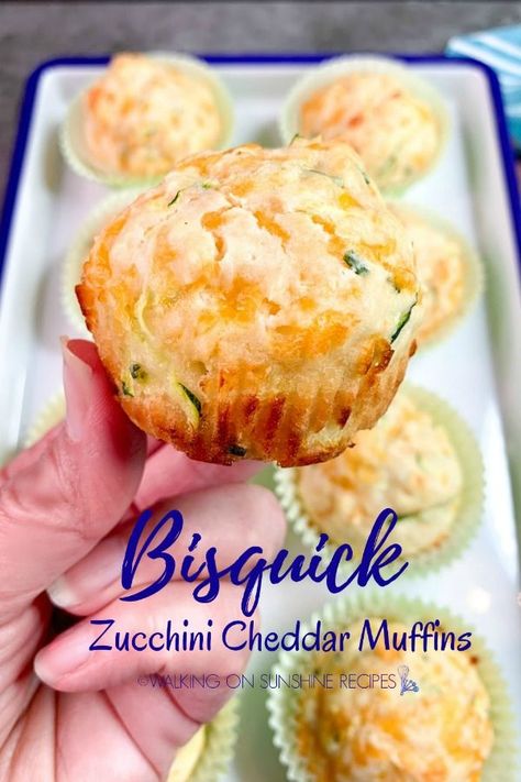 Bisquick Zucchini Cheddar Muffins - the perfect savory muffin filled with grated zucchini, chives and cheese that uses Bisquik Baking Mix from Walking on Sunshine Recipes. Zucchini And Bisquick Recipes, Bisquick Zucchini Cheddar Muffins, Recipes Using Grated Zucchini, Zucchini Puffs Recipes, Recipes Using Bisquick Baking, Zucchini Ricotta Recipes, Grated Zucchini Recipes, Zucchini Biscuits, Bisquick Zucchini