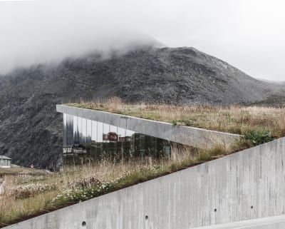 Reiulf Ramstad Architects, Rasmus Hjortshøj · Trollstigen Visitor Centre Alpine Architecture, Underground House, Earth Sheltered, Underground Homes, Earth Homes, Architecture Rendering, Visitor Center, House On A Hill, Green Roof