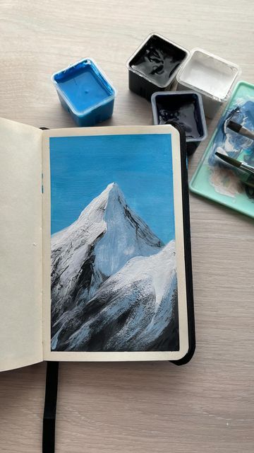 Nurzhan gouache artist on Instagram: "painting great mountains 🗻 this time And it’s day 24 of me painting everyday until I complete my sketchbook 📓 see you tomorrow #paintingprocess #mountainpainting #gouacheart #gouachepainting #sketchbook #artistoninstagram #gouacheartist" Gouache Art, Mountain Paintings, Painting Process, Gouache Painting, Creative Makeup, Cute Drawings, Sketch Book, Drawings