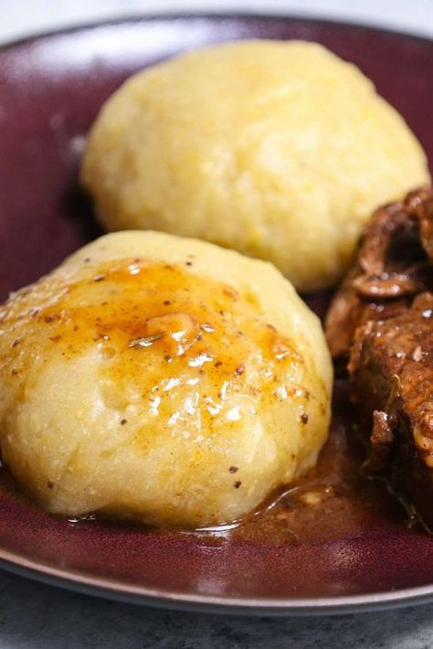 Fufu is a staple food in many countries in West Africa, Central Africa, and the Caribbean. Traditionally it can be made with starchy food like cassava, yams or plantains. This easy fufu recipe boils cassava and plantains first, and then blend them into a dough-like consistency. Finally, it’s shaped into small balls and served with soup, stew, or sauce. So satisfying and delicious! #African #sides #Vegetables Fou Fou Recipe, African Food For Kids, Fu Fu Recipe African, Easy Fufu Recipe, Fufu Recipe Africans, African Fufu, Fufu Recipe, Afrikaans Recipes, Cassava Recipes