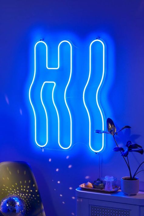 Greet guests on the way in with this wavey neon light for your space. LED neon sign features a 'Hi' slogan and groovy lettering. Mounted onto an acrylic back for effortlessly attaching to your wall. Plugs into mains to power on. Star Pendant Lighting, Neon Sign Shop, Novelty Lighting, Neon Light Signs, Party Lights, Custom Neon Signs, Led Signs, Led Neon Signs, Party Signs