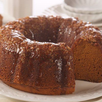 Pumpkin makes a delightful addition to your rum cake! The rum butter glaze in this recipe adds elegance and flavor to this classic cake. Pecan Rum Cake, Boozy Cakes, Jamaican Patties, Rum Cakes, Pumpkin Food, Buttermilk Pound Cake, Rum Cake Recipe, Pumpkin Recipe, Pumpkin Desserts