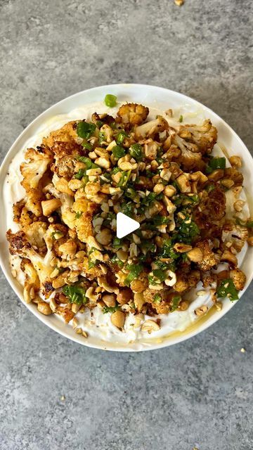 Caitlin Greene on Instagram: "HONEY BUTTER CAULIFLOWER WITH ROASTED GARLIC WHIP & LEMON-CASHEW-SCALLION CRUMBLE! I recommend doubling this! • For the cauliflower: 1 cauliflower, cut into florets 3 tbsp. butter, melted 1-1 1/2 tbsp honey 3/4 tsp salt 1 tsp dried oregano 1 tsp paprika • For the crumble: 1/2 cup cashews 1/4 cup chopped scallions 1 tsp lemon zest Heavy pinch salt Pepper 1/2 tbsp olive oil • Roasted Garlic Whip: 2 heads roasted garlic 1/2 cup plain Greek yogurt 1/2 cup ricotta che Garlic Whip, Caitlin Greene, Butter Cauliflower, Sticky Sesame Cauliflower, Healthy Food Recipies, Sweet Potato Recipes Roasted, Meatless Dishes, Cauliflower Cheese, Honey Roasted