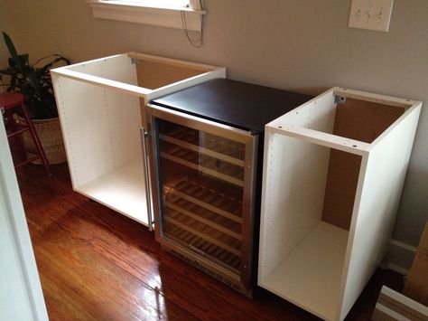 kitchen cabinets into bar | the cabinets, placed our wine fridge between two Akurum base cabinets ... Mini Fridge Cabinet Ikea, Diy Mini Fridge Cabinet, Diy Mini Fridge, Wine Fridge Cabinet, Mini Fridge Cabinet, Cabinet Ikea, Diy Butcher Block, Fridge Cabinet, Ikea Bar