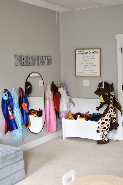 Basement Playroom Corner, Playroom With Dress Up Area, Playroom Mirror Ideas, Playroom Shelf Ideas, Five Year Old Playroom, Playroom Picture Ideas, Renter Friendly Playroom, Entry Room Playroom, Art Area Playroom