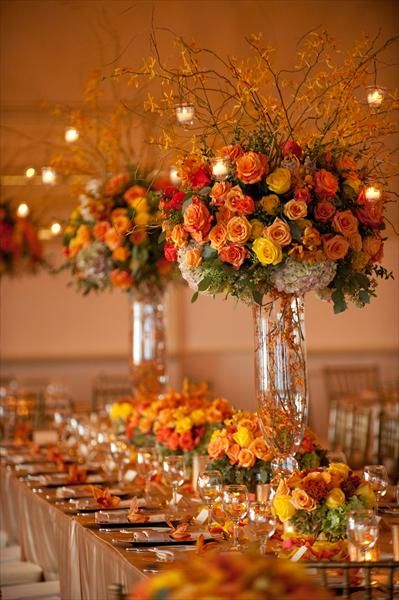 ooooooh....can't afford it with all the roses, but you could use other flowers and create the same look. Orange Wedding Centerpieces, Tafel Decor, Wedding Floral Centerpieces, Tall Centerpieces, Fall Wedding Flowers, Elegant Dinner, Fall Wedding Decorations, Orange Wedding, Long Table