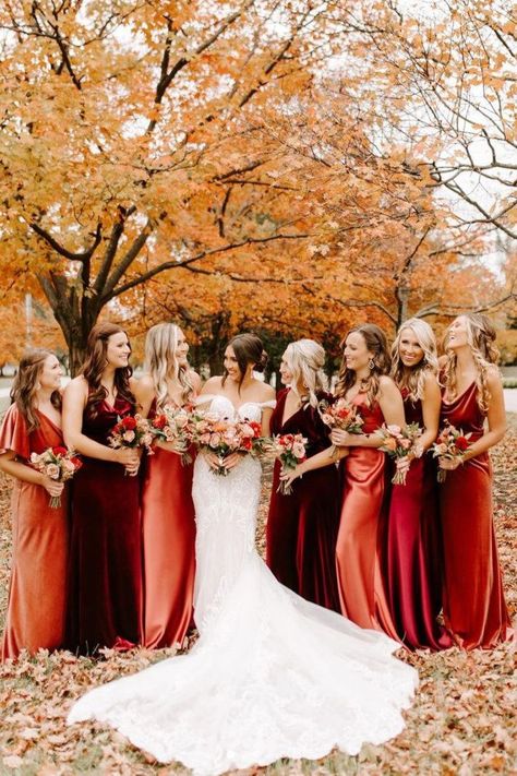 Fall long mismatched bridesmaid dresses for an autumn affair | Beautiful outdoor bridal party wedding photo ideas | Morgan and Spencer's Wedding video at The Otten On Main in Kansas City, Missouri by Moonlit Visuals - Love Stories TV Fall Wedding Burgundy Bridesmaid Dresses, Azazie Bridesmaid Dresses Mix And Match Fall, Cinnamon Wedding Flowers, Red Shades Bridesmaid Dresses, Spice And Navy Wedding, Fall Wedding Mismatched Bridesmaids, Fall Mismatched Bridesmaid Dresses, Cabernet Wedding, Bridesmaid Color Palette