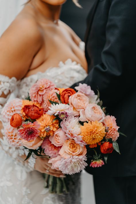 Dahlias, ranunculus, and roses bridal bouquet in bright summer colors. PC Hillside Film & Photo Dahlia Wedding Decor, Wedding Ranunculus, Dahlia Bride Bouquet, Bridal Bouquet August, Fall Wedding Bouquet Dahlia, Dahlia And Ranunculus Bouquet, Dahlia Ranunculus Bouquet, Dahlia Bouquet Wedding, Bright Dahlia Wedding Bouquets