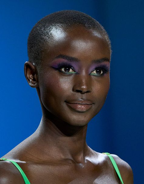 The best runway beauty trends of 2023 so far Sergio Hudson, Neon Eyeshadow, Silver Eyeshadow, Runway Beauty, Graphic Liner, Bare Face, Angled Brush, Lower Lashes, Liquid Eyeshadow