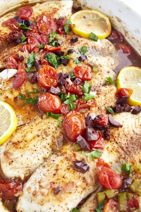 Prepare this easy baked Mediterranean tilapia recipe in less than an hour for a flavor-loaded, nutrient-rich dinner! Mediterranean Tilapia, Easy Tilapia, Tilapia Dinner, Tilapia Recipes Healthy, Oven Baked Tilapia, Tilapia Recipes Easy, Fresh Fish Recipes, Baked Tilapia Recipes, Tilapia Recipe