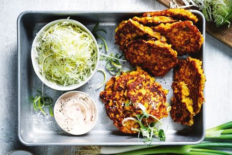 Harness the goodness of frozen veg to serve up this fan-favourite fritter. Vegan Cauliflower Fritters, Indonesian Corn Fritters, Carrot And Courgette Fritters, Courgette Fritters Vegan, Vegan Zucchini Potato Fritters, Pea Fritters, Potato Fritters, Delicious Magazine, Corn Fritters