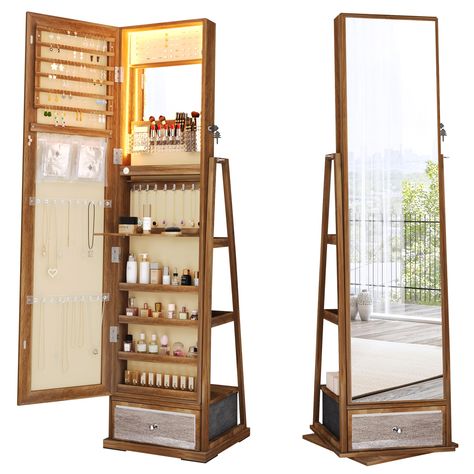 PRICES MAY VARY. Jewelry/Beauty Products Have Found Their Home: This jewelry cabinet is thoughtfully designed with earring slots, necklace hooks, and ring slots, providing the perfect haven for your precious items. Additionally, you can use the organizer's pockets, plastic trays, and storage shelves to give your cherished cosmetics the ideal sanctuary. Foldable Acrylic Panel and Built-In Makeup Mirror: Conveniently arrange your cosmetics and jewelry for makeup, jewelry trials, and skincare with Small Storage For Bedroom, Bathroom Mirror Organizer, Room Decor With Wooden Furniture, Aesthetic Decor Items For Bedroom, Apartment Decor Storage, Rotating Jewelry Organizer, Bathroom Jewelry Storage, Bedroom Mirror With Storage, Funky Wood Furniture