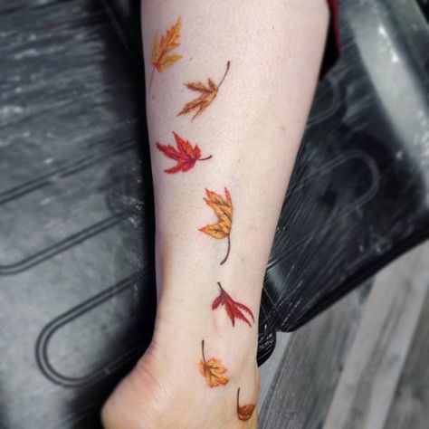 Leaves Tattoo Meaning, Falling Leaves Tattoo, Autumn Leaves Tattoo, Trees Tattoos, Tree With Falling Leaves, Leaf Tattoo Design, Maple Leaf Tattoos, Fall Leaves Tattoo, Leaves Tattoo