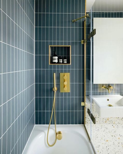 Vertical Tiles - A trend used to draw the eye upwards creating the illusion of higher ceilings, great for smaller spaces or feature areas. This design style is a relatively cost effective option if using the classic subway tile vertically rather than horizontally. . . . . . . . . . . . Vertical tiles credited to: @honkyinteriordesign @amystoddartstudio @kimberlyparkerdesign @bannerdayinteriors @kastconcretebasins @houseandgardenuk @fionadukeinteriors @matildebromann @dilorenzo_tiles... Dilorenzo Tiles, Navy Kitchen, Grand Central, Brass Fittings, Urban Living, Oak Floors, Subway Tile, High Ceiling, Art And Architecture