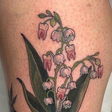 Sophie Jess on Instagram: "Some recent colour pieces. [1+2] lily of valley and teeth, and then a scapula and seaweed for Katy - reflecting the belief in folklore that witches could cross the sea/be prevented from drowning using a scapula. I do bloody love a folklore tattoo. [3] orchids for Kimi 🤍" Skull Lily Of The Valley Tattoo, Teeth Flower Tattoo, Blue Mushroom Tattoo, Florida Swamp Tattoo, Edgy Forearm Tattoo, Ghost Lily Of The Valley, Fiddle Head Tattoo, Termite Tattoo, Mullein Tattoo