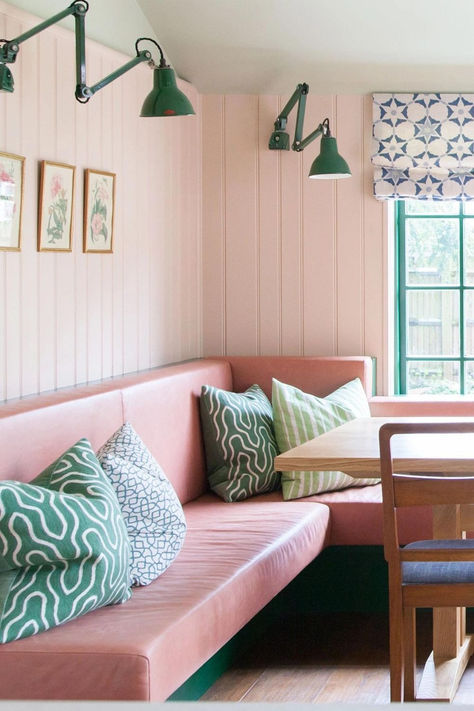 The ultimate in retro diner-style, this bespoke banquette dining nook, featuring pink leather seating is a masterstroke and offers a versatile dining spot that’s ideal for quick meals or can be dressed up for formal occasions. The wall lights are vintage fittings and the blind fabric is from Vanderhurd. The paneling is painted in Setting Plaster, while the walls are painted in Vert de Terre, both Farrow & Ball. 

Image credit: Megan Taylor Vintage Banquette Seating, Pink Banquette, Dining Nook Decor, Setting Plaster, Banquette Dining, Nook Decor, Ball Image, Retro Diner, Fabric Blinds