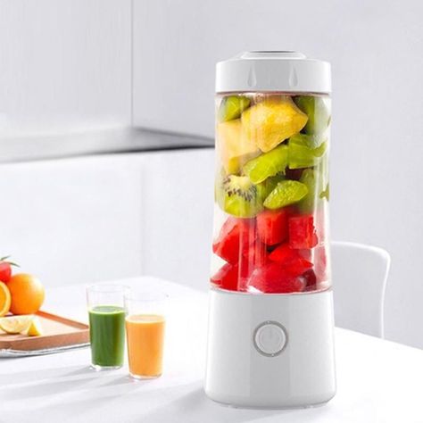 Enjoy fresh juice anywhere with our High-Speed Mini Portable Juicer! 🍹⚡ Compact and USB-powered for on-the-go convenience. Shop now! Portable Juicer, Fruit Blender, Healthy Afternoon Snacks, Electric Juicer, Stoneware Dinnerware Sets, Bath Bathroom, Amazon Sale, Portable Blender, Stoneware Dinnerware