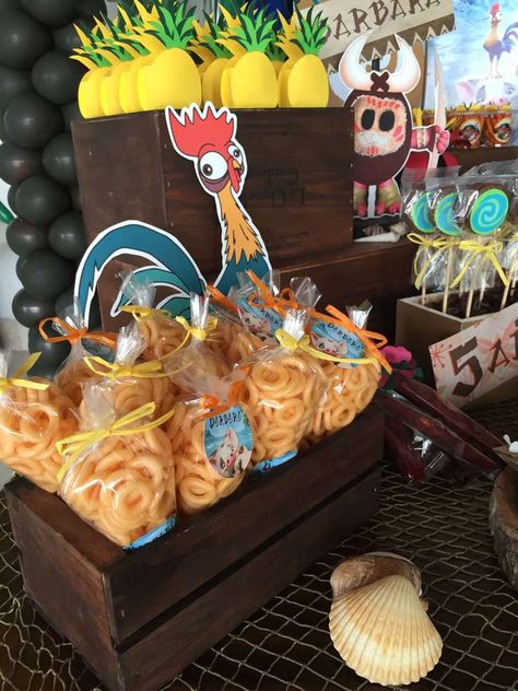 Moana's Bash | CatchMyParty.com Moana Candy Table Ideas, Moana Birthday Table Decor, Moana Birthday Theme Ideas, Moana Birthday Party Ideas For Boys, Moana Birthday Food, Moana Birthday Food Ideas, Baby Moana Birthday Party Decorations, Moana Snacks, Moana Food Ideas For Party