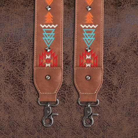 This fun guitar inspired strap elevates your bags with a touch of comfort and a fresh versatile attitude. Suitable for bags of all sizes, from purses and totes. Made of PU leather, this western guitar style crossbody strap has:- Embroidered Aztec pattern Antique silver studs Dimensions: 2" width, 46" length Mix and Match these purse straps with our Crossbody Bag Western Guitar, Aztec Pattern, Purse Strap, Crossbody Strap, Silver Studs, You Bag, Montana, Antique Silver, Christmas Diy