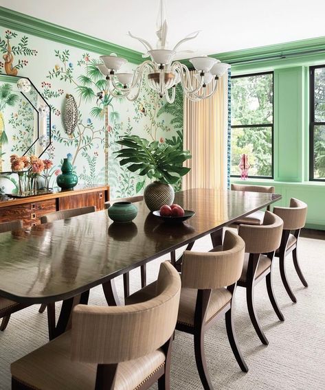 Katie Ridder Inc. on Instagram: “A formal dining room in the tree canopy, wrapped in @degournay’s Amazonia wallpaper and framed by pistachio millwork. Photography:…” Katie Ridder, White Glass Chandelier, Upholstered Banquette, Dining Table Light, Huge Library, Manhattan Apartment, Tree Canopy, Luxurious Home, Luxe Interiors