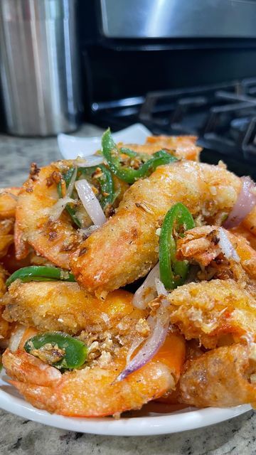 Joedy Tran on Instagram: "Crispy Salt and Pepper shrimp/tôm rang muối recipe…………….. Everyone has there own and this is my. Brought my shrimp from Costco but you can get head on shrimp at most Asian Supermarkets.   Recipe: •1 tablespoons cooking oil  •2 tablespoon minced garlic (more if preferred) •1-2 jalapeño (sliced) •1/4 cup shallots   Recipe for shrimp 🦐  •18-20 jumbo head on shell on shrimp(deveined) •1/2 teaspoons garlic powder  •1/2 teaspoons onion powder  •1/2 teaspoons ground black pepper  •1/4 cup cornstarch  Mix well. Fry for 2-3 minutes at 400f. Quick fry on high. Will make the shrimp crispy on the outside but not overcooked on the inside. Place on cooling rack to stay crispy.   Salt and pepper seasoning: •1 teaspoons salt  •1 teaspoons ground black pepper  •2 teaspoons sugar Head On Shrimp, Panko Shrimp, Shallots Recipe, Recipe For Shrimp, Fried Shrimp Recipes, Shallot Recipes, Salt And Pepper Shrimp, Seafood Dish Recipes, Pepper Shrimp