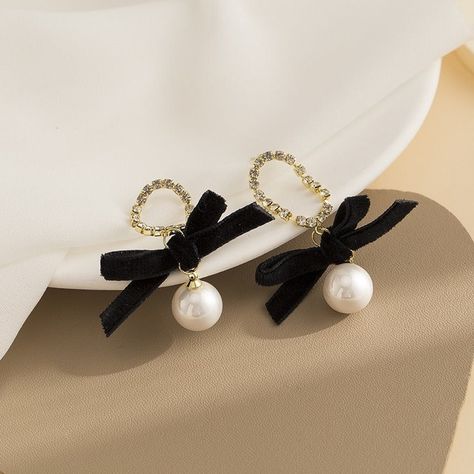 Black bow pearl long earrings, fashionable and elegant, light luxury mosquito coil ear clip https://seamlesscollection2.myshopify.com/products/black-bow-pearl-long-earrings-fashionable-and-elegant-light-luxury-mosquito-coil-ear-clip Seamless collection #Hot Pearl Long Earrings, Mosquito Coil, Long Pearl Earrings, Black Velvet Bow, Bow Earrings, Velvet Bow, Pearl Earrings Dangle, Black And White Colour, Black Bow