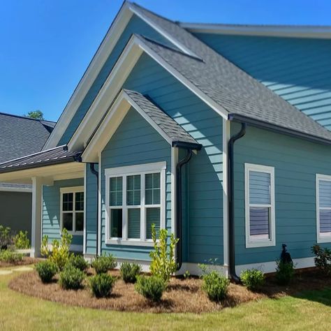 Buttercream House Exterior, Moody Blue Sherwin Williams Exterior, Cream And Teal House Exterior, Soft Blue House Exterior, Teal And Cedar House Exterior, Dusty Teal House Exterior, Blue Green Grey Exterior House Colors, Teal Farmhouse Exterior, Teal House Exterior White Trim