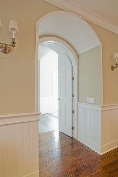 How to Install a Door in an Archway | Hunker Wainscoting Height, Wainscoting Hallway, Wainscoting Stairs, Wainscoting Kitchen, Faux Wainscoting, Arched Doorways, Painted Wainscoting, Wainscoting Bedroom, Wainscoting Bathroom