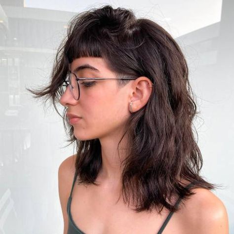 50 Women’s Undercut Hairstyles to Make a Statement in 2024 Undercut And Side Shave, Haircut With Sides Shaved, Undercut With Bangs Long, Undercut Wavy Hair For Women, Shaved Side Ponytail, Short Hair Sides Shaved, Shaved Sides With Long Hair, Back Undercut Women, Sides Shaved Women