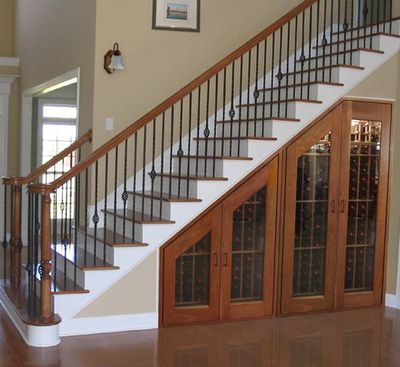 under stairs wine cabinet - and/or space for a cigar humidor for my husband @Rene' Balleras-Lampley Reyes Under Stairs Wine Cellar, Under Stairs Storage Solutions, Space Under Stairs, تحت الدرج, Pintu Interior, Modern Wine Rack, Wine Closet, Traditional Staircase, Stair Case