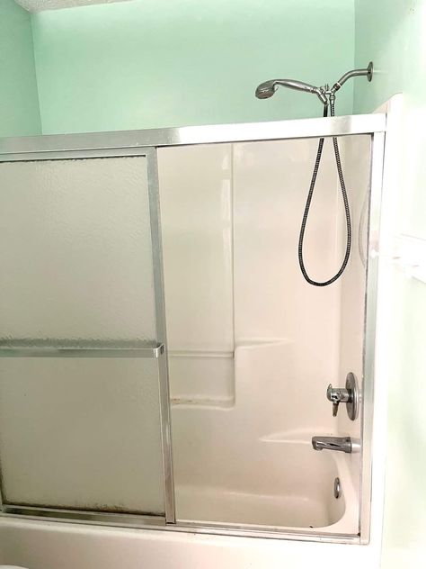 Replacing a Dated Glass Shower Door with a Double Rod and Curtains - Pure Happy Home Glass Shower Door With Curtain, How To Remove Shower Doors, Replace Shower Door With Curtain, Replacing Shower Doors With Curtain, Shower Curtain Over Glass Door, Shower Curtain Over Glass Door Ideas, Sliding Shower Door Makeover, Replace Shower Door, Grid Shower Door