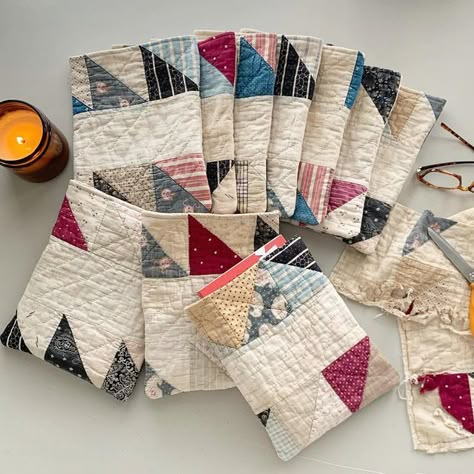 Tami Gray Voth on Instagram: "I’ve been reading a lot lately and thought about making some book sleeves. I dug through a pile of old quilts and found one that would work. There’s LOTS of staining, some holes and missing fabric, but it’s hand quilted and I love that! They measure 8” x 10” and I used the same quilt on the back. They are not lined and there are raw edges that may fray. The inside of the sleeve is the back side of the quilt. Such a great way to protect books while hugging them in an Fabric Book Pouch, Quilt Repurpose, Quilt Upcycle Ideas, Old Quilt Projects, Upcycle Old Quilts, Recycled Quilts, Repurpose Old Quilts, Old Quilt Crafts, Upcycle Quilt Ideas