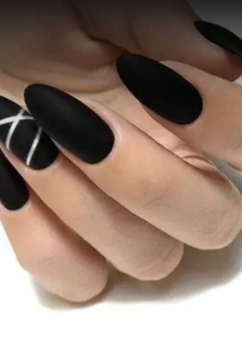 Get inspired by this elegant and sophisticated look featuring black classy almond nails. This stylish nail design is perfect for any occasion, adding a touch of glamour to your overall style. Embrace timeless beauty with these chic black nails that will effortlessly elevate your look. Whether you're heading to a special event or simply want to treat yourself to a luxurious manicure, these almond nails are sure to make a statement. Try out this classic yet modern nail trend and showcase your impe Classy Almond Nails, Modern Nails, Stylish Nails Designs, Classic Nails, Popular Nails, Black Nails, Treat Yourself, Nail Trends, Almond Nails