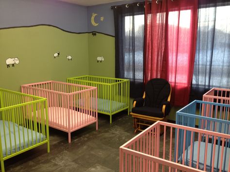 sleep time area for Infants 3 months to 30 months old. The sleep area should have cribs adequately spaced apart with a rocking chair or two. It should have dim lighting since this area is for sleeping, and should also be painted calm colors. The foundations to go with this is PHG1.1: Demonstrate development of healthy practice and PHG1.2: Demonstrate development of safety practices. Inhome Daycare, Toddler Daycare Rooms, Nap Room, Infant Room Daycare, Kids Hospital, Daycare Spaces, Infant Daycare, Daycare Furniture, Daycare Rooms