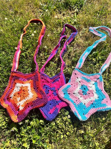 this is a made to order Pride star bag specifically for my international folks out there :) it's totally fine if you live in the us to order on here. More pride colors coming soon! if you live in the US i recommend heading to my shop for better prices. this made to order bag will take 2-4 weeks and will ship 2-3 days after i finish making it keep in mind i am a full time mom and i am working as fast as i can :) keep in mind, this yarn is multiple colors so every bag will come out a little different  everytime Pride Sewing Projects, Pride Day Outfits, Pride Crochet Ideas, Crochet Star Bag, Crochet Bag Ideas, Pride Crochet, Star Bag, Confection Au Crochet, Pride Colors