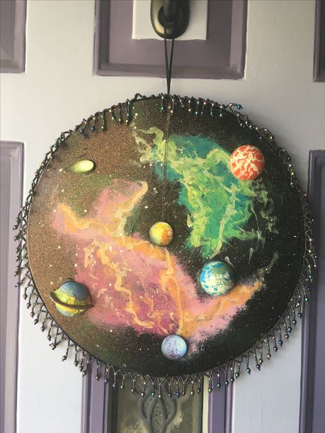 Old vinyl record up cycle. Painted nebulas, painted styrofoam balls into planets, added glitter spray and stickers. BAM! New door hanging wreath! Galaxy Wreath, Up Cycle, 42nd Birthday, Old Vinyl Records, Hitchhikers Guide To The Galaxy, Nebulas, Glitter Spray, Guide To The Galaxy, Styrofoam Ball