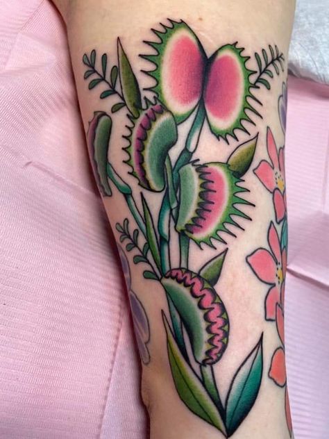 Unique Girly Tattoos, Small Filler Tattoo Ideas Traditional, Neo Traditional Plant Tattoo, Traditional Oyster Tattoo, American Traditional Lily Tattoo, American Trad Plant Tattoo, Girlie Traditional Tattoos, Traditional Foliage Tattoo, Leg Tattoos Traditional