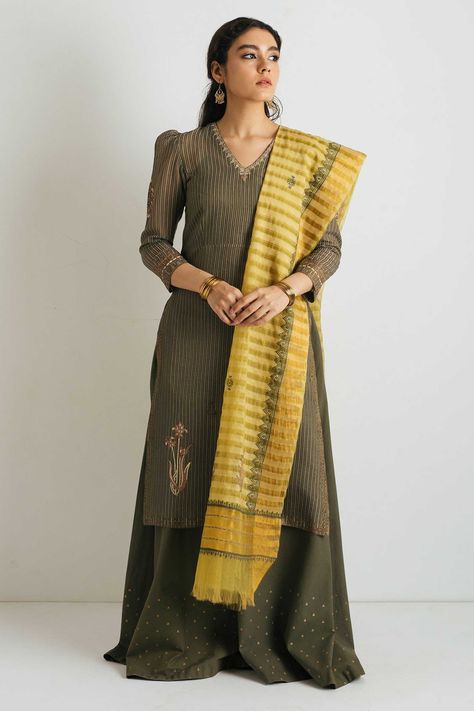 Top: Striped Woven Organza Undershirt: Muslin Lower: Cambric Dupatta: Striped Organza Green straight fit block printed long shirt with puffy sleeves and embroidery detail on neckline paired with block printed sharara pants with pockets and a light green block printed dupatta Wear gold jhumkis to rock your look! DISCLAIMER: This product has been handmade by artisans, ensuring a personal and unique quality to each product. Minor distinctions are an inherent quality of handmade goods, making your p Shirt With Puffy Sleeves, Printed Sharara, Zara Shahjahan, Sharara Pants, Pakistani Lawn Suits, Women Suits, Printed Dupatta, Lawn Suits, Eid Collection