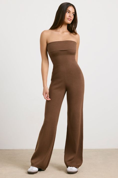 Designed to be loved by you, every day. The Timeless unitard is a sleek wardrobe essential that can be worn on its own or layered with the Lounge shrug for a coordinated look. Its crafted from our stretchy chunky-knit fabric with a foldover bandeau neckline and features a body-contouring fit with a flattering kick flare trouser. 
 
 Foldover bandeau neckline 
 Pull-on design 
 Kick flare trousers 
 Soft and stretchy chunky knit fabric (100% Cotton) 
 Full length, approx. 129 cms based on size S Sleek Wardrobe, Bandeau Jumpsuit, Black Backless Dress, The Lounge, Kick Flares, Bride Clothes, To Be Loved, Flare Trousers, Clean Girl