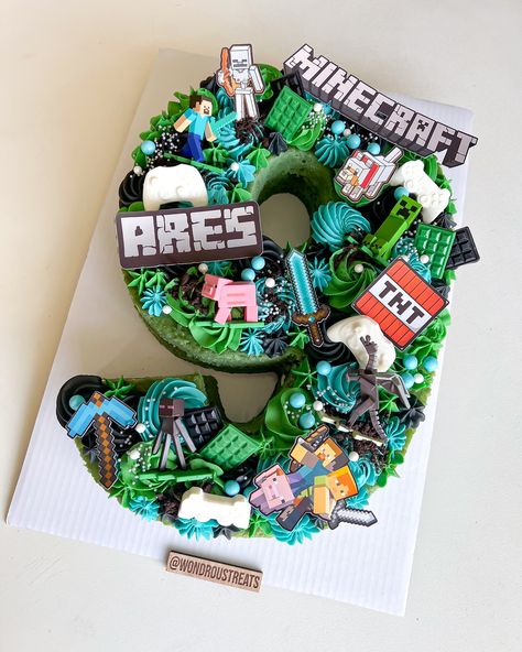 Check out this Minecraft number cake we made for Ares’ 9th birthday! 🎮✨ Perfect for a little gamer’s big day. #minecraft#minecraftbirthday#minecraftcake#cake#lasvegascakes#minecraftnumbercake#numbercake#lasvegas#cake Gamer Cookie Cake, Gamer Bday Cake, Gamer Cakes For Boys, Lego Minecraft Cake, Minecraft Number Cake, Gamer Cake Ideas Boys, 9th Birthday Boy Ideas, Minecraft Theme Cake, Birthday Cake Minecraft